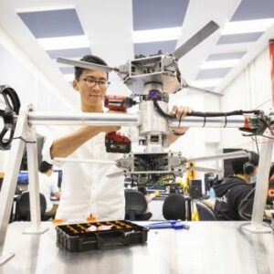 Lead researcher works on prototype